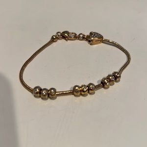 Brighton Gold Bracelet with 9 charms/beads